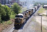 UP 9434 leads two other UP units and NS train 135 westbound